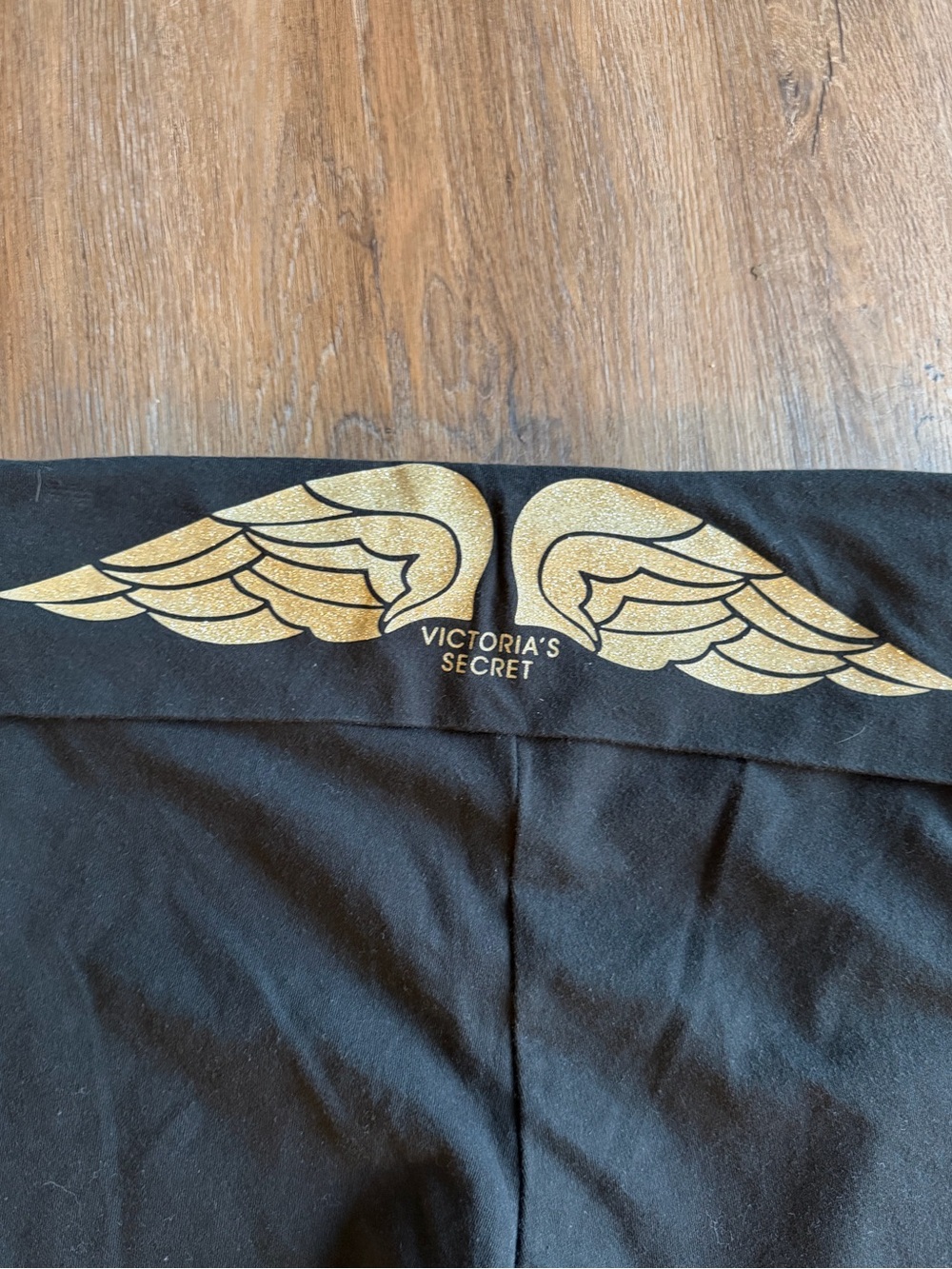 Y2K fold over cropped leggings with gold wings